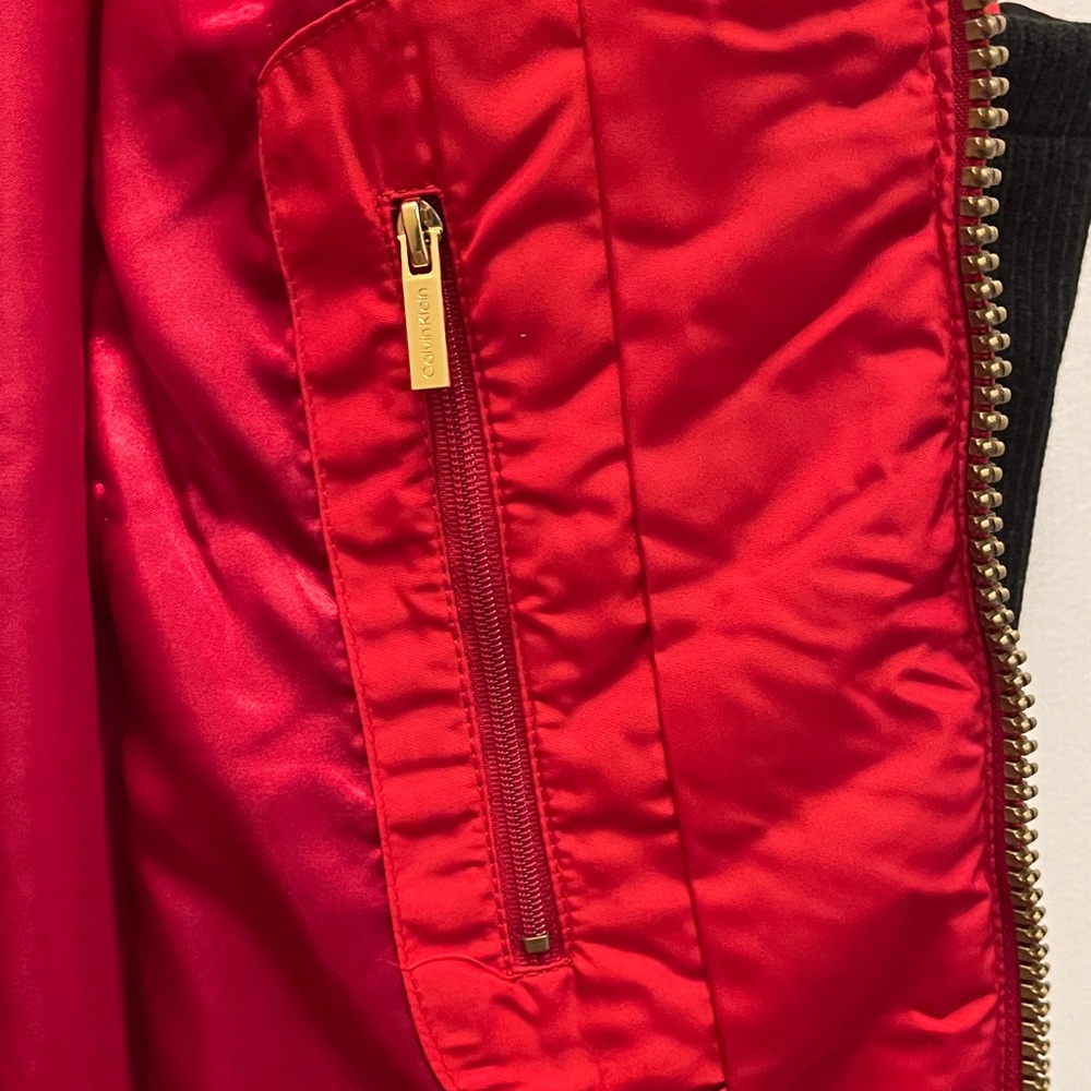 Calvin Klein Women's Red and Black Quilted Vest with an inside zippered pocket. - Picture 6 of 7
